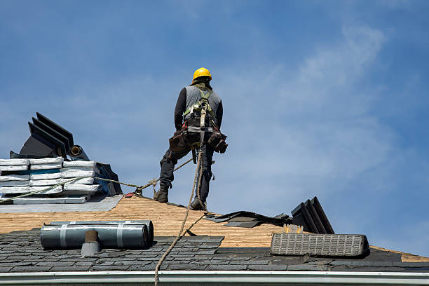 Professional Roof Replacement technician working in Wheeler, IN